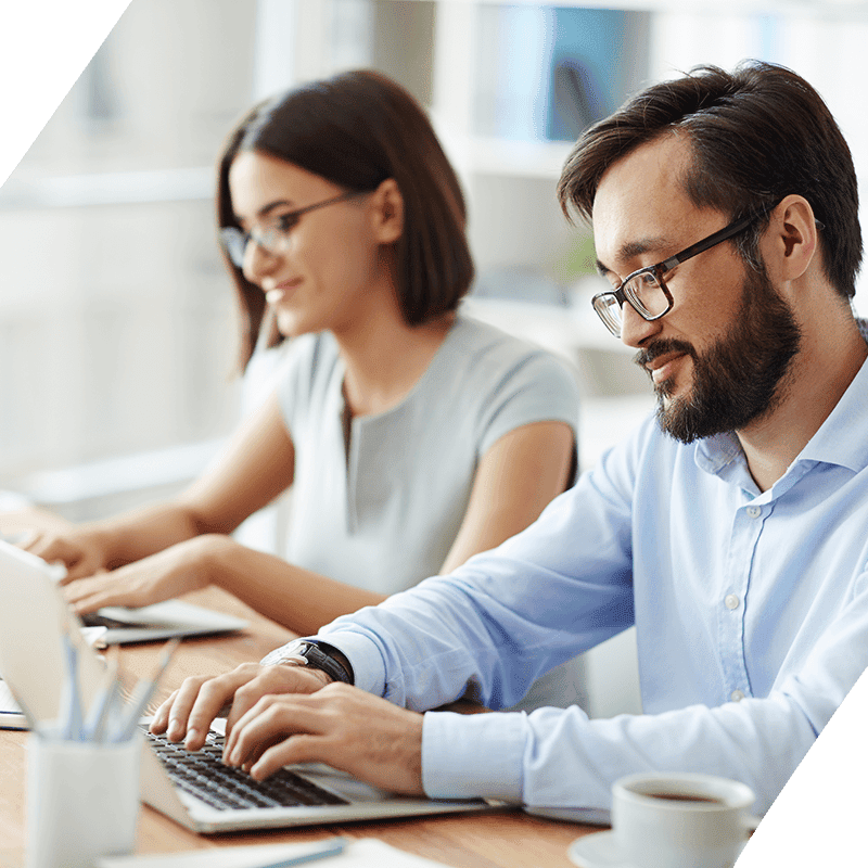 A man and woman working on an IT project